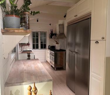 Nykvarn Casa | Åretrunt stuga med fiskebåt