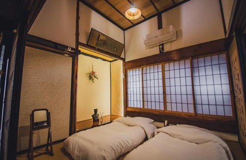 Sado Villa | 佐渡島 築120年の古民家一棟貸切 河崎浪漫館 囲炉裏体験 檜風呂-蔵サウナ完備