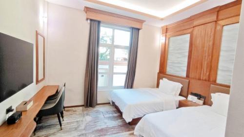 Vientiane Hotel | 鸿业远图酒店