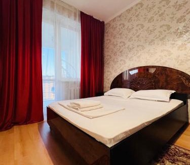 Nur-Sultan Apartamento | 153 Уютные апартаменты с видом на Байтерек и поющие фонтаны с 2 кроватями King и диваном на 10 этаже