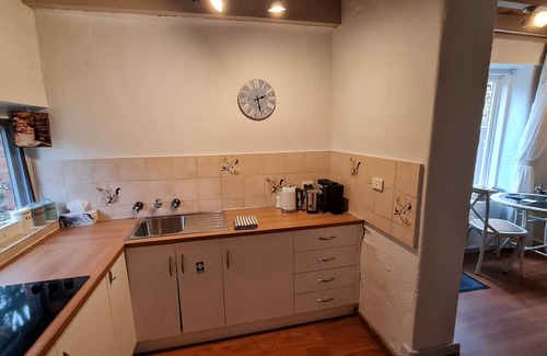 Jutland Chalet De Esquí | 1890s stone hayloft overlooking beautiful gardens and courtyard.