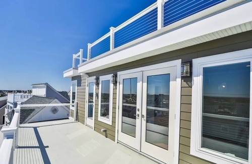 Normandy Beach Casa | 5 Star Luxury Waterfront Beach House-Easy Bay Access from Lagoon