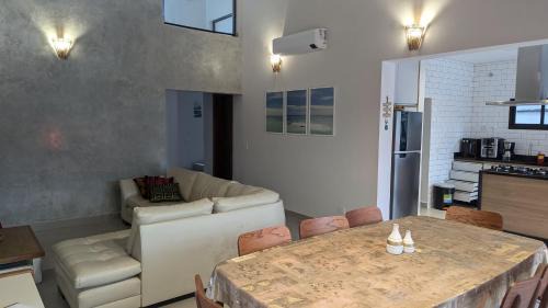 Costa do Sol Casa | 50m praia Cond pé na areia Alto padrao 4 suites Segur 24h Costa do sol Guaratuba Bertioga prox Riviera