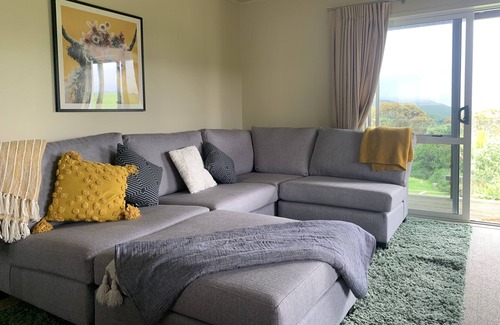 Awhitu Casa | A sunset paradise, 3 bedroom home on a hill with views to the ocean