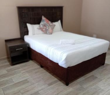 Klerksdorp Casa | AMANI PALMS GUEST HOUSE
