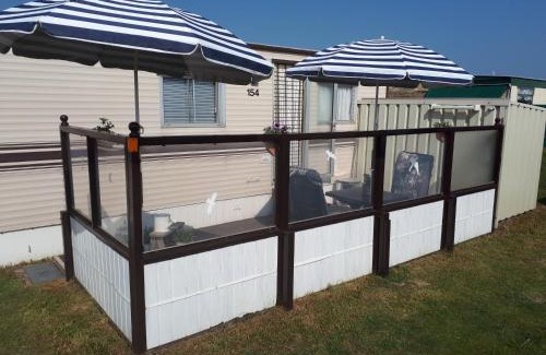 Nes Casa | AMELAND-Nes-Duinoord: Stacaravan (chalet) + fietsen direct aan zee!