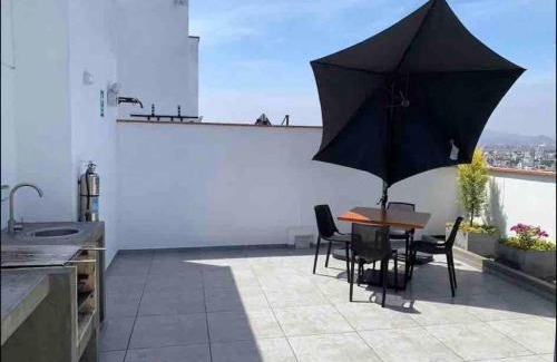 La Perla Apartamento | An apartment with an ocean view