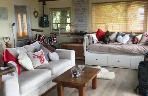 Llanasa Hotel | Angies Den - quirky cabin with hot tub & views