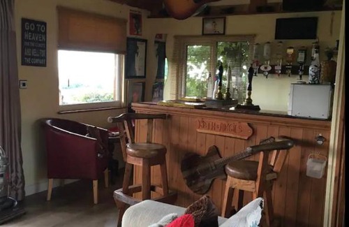 Llanasa Hotel | Angies Den - quirky cabin with hot tub & views