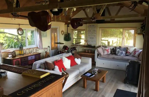 Llanasa Hotel | Angies Den - quirky cabin with hot tub & views