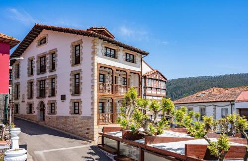 Bustio Casa | Apartamentos El Rincón de Bustio