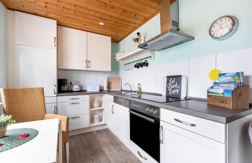 Meldorf Apartamento | Apartamento 'Doppelhaushälfte Ida' con terraza privada, jardín compartido y Wi-Fi