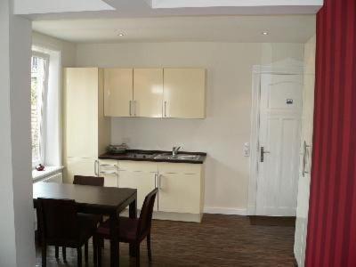 Niebuell Apartamento | Apartment Im Hotel Insel Pension In Niebüll