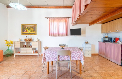 Granelli Apartamento | Apartamento 'Nonna Rosa' con terraza privada, jardín compartido y aire acondicionado