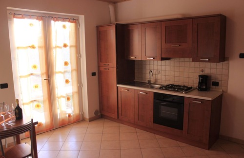 Malcesine Apartamento | Apartamento con jardín, piscina climatizada, wifi, parking interno