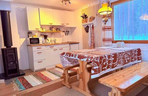 Rovaniemi Chalet De Esquí | Aurora Cottage Otsola - A Cozy Lakefront Wilderness Hideaway, Less Than an Hour from Rovaniemi