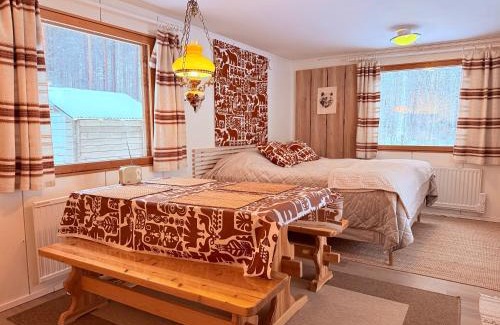 Rovaniemi Chalet De Esquí | Aurora Cottage Otsola - A Cozy Lakefront Wilderness Hideaway, Less Than an Hour from Rovaniemi