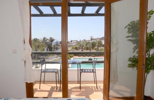 Charco del Palo Apartamento | B16-Dúplex luminoso+ piscina a 150 m del mar