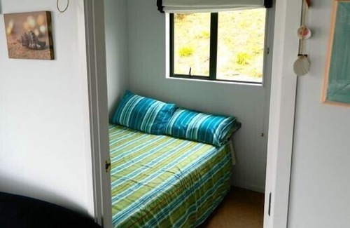 Opito Bay Cabaña | Bach con vista - Opito Bay Bach