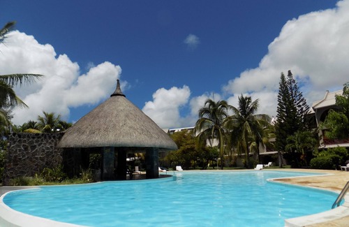 Bain Boeuf Casa | The Beach Retreat, dúplex con piscina en un gran jardín tropical