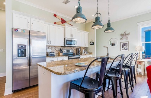 Gulf Shores Cabaña | Beach-view cottage near beach with pool, wrap-around balcony, boat dock, W/D, AC