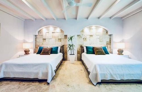 Área de Playacar Fase I Villa | Villa frente al mar para grupos grandes, con personal completo con transporte incluido, todo incluido opcional