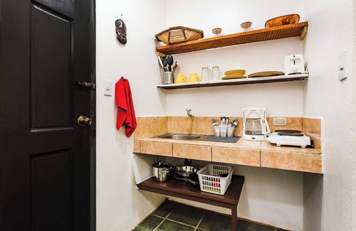 Palm Beach Estates Apartamento | Cabinas totalmente equipadas a 5 minutos a pie de la playa. C.A. WIFI. Cocina. Tablas Bicicletas