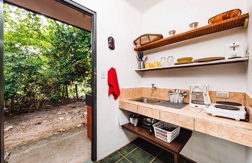 Palm Beach Estates Apartamento | Cabinas totalmente equipadas a 5 minutos a pie de la playa. C.A. WIFI. Cocina. Tablas Bicicletas