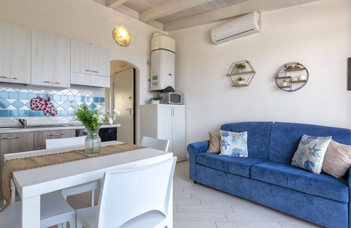 Paduledda Apartamento | Precioso apartamento para 4 personas con A/C, piscina, TV, terraza y mascotas permitida