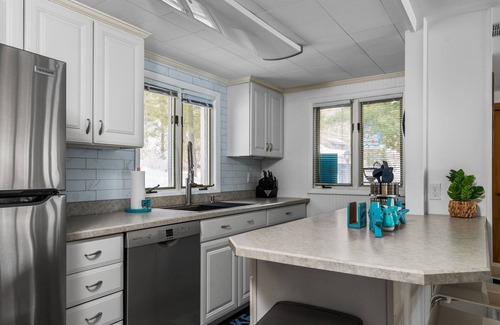 Lake Township Casa | Beautiful Beachfront Home on Crystal Lake