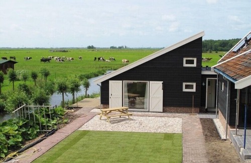 's-Molenaarsbuurt Cabaña | Atmosférica, casa de campo junto al molino, con el molino y polderzicht