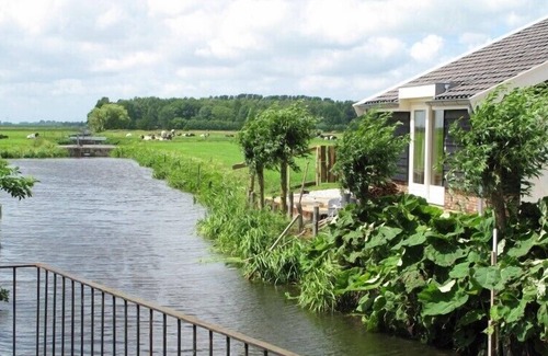 's-Molenaarsbuurt Cabaña | Atmosférica, casa de campo junto al molino, con el molino y polderzicht