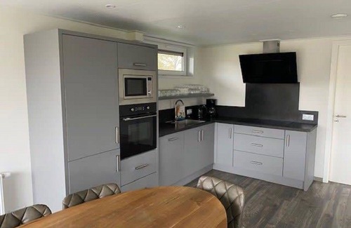 Biddinghuizen Casa | Preciosa casa de vacaciones privada para 10 personas con WIFI, piscina, TV y terraza