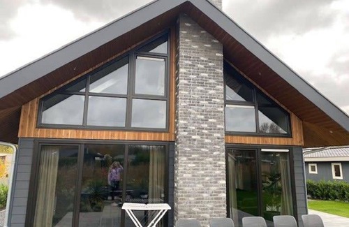 Biddinghuizen Casa | Preciosa casa de vacaciones privada para 10 personas con WIFI, piscina, TV y terraza