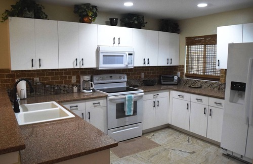 Fort Myers Casa | Hermosa propiedad frente al mar, acceso directo al golfo, piscina climatizada de agua salada y spa