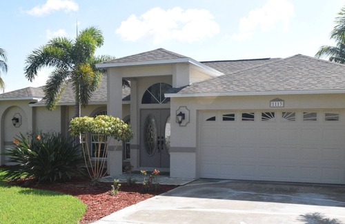 Fort Myers Casa | Hermosa propiedad frente al mar, acceso directo al golfo, piscina climatizada de agua salada y spa
