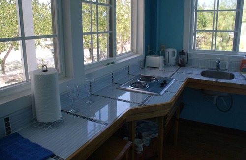 Cayo Corker Cabaña | Birdhouses Woodpecker is a very unique place in the sunset side of the island.