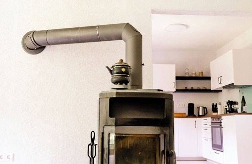 Darstein Casa | birds-nest holiday home palatian forest balcony wood stove