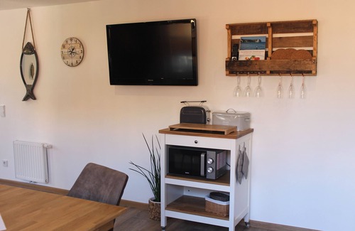 Born auf dem Darss Casa | La mitad de la casa de vacaciones Boddenkahn