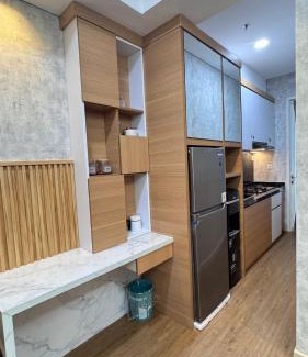 Balikpapan Apartamento | Borneo Bay - 1BR lt 23 view laut dan kolam renang