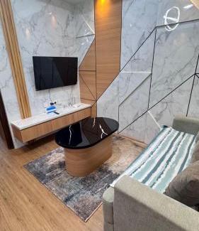 Balikpapan Apartamento | Borneo Bay - 1BR lt 23 view laut dan kolam renang