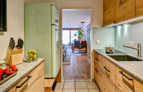 Berguen Apartamento | Breathtaking view of the mountains, child-friendly, fireplace, terrace, top equipment
