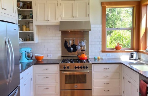 Lopez Island Casa | Bright art-filled home, fruit trees, valley view