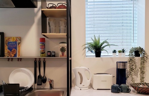 Metro Vancouver Regional District Casa | Bright basement suite by Event Centre with 2 bed,private entrance & free parking