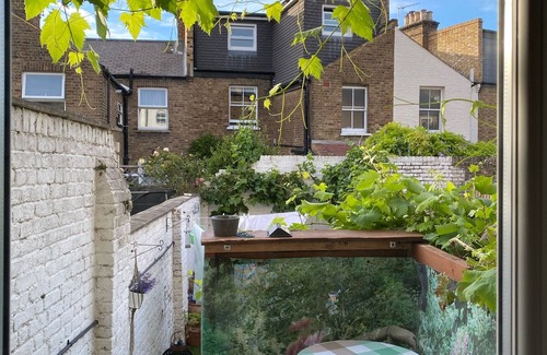 Walpole Apartamento | Luminoso apartamento de jardín en Ealing - 3 minutos de la línea Piccadilly