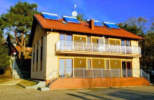 Nowa Karczma Otro | Całoroczny drewniany domek Superior i apartamenty Eko-oaza w Krynica Morska-Piaski