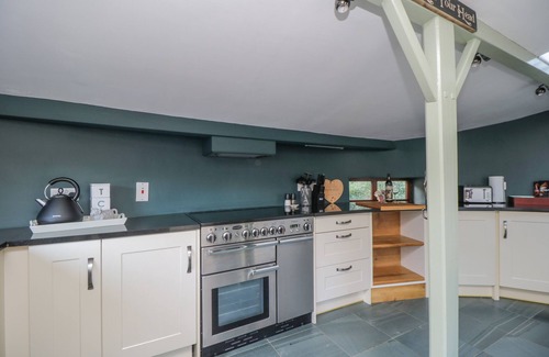 Stainburn Cabaña | CAMERTON HALL COTTAGE, pet friendly, with open fire in Cockermouth