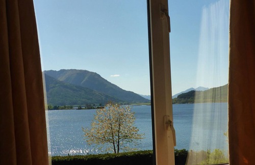 Glencoe Cabaña | Camus Bhan: una encantadora casa familiar en Glencoe con impresionantes vistas sobre Loch Leven.