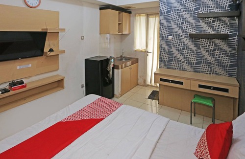 South Tangerang Hotel | Capital O 92971 Pelangi Residence