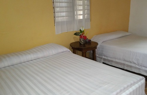 El Triunfo de La Cruz Cama Y Desayuno | Caribbean Coral Inn Tela